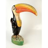 A Guinness fibreglass toucan, 1950s, height 68.5cm, width 52cm.