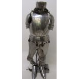 A suit of armour, comprising a nasal helmet with chainmail neckpiece, a cuirass, pauldrons,