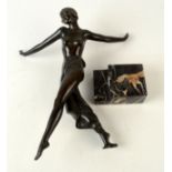 An Art Deco spelter figure of a dancing classical lady, on a stepped marble base, height 34cm.