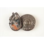 A Cornish Stone Company silver mounted moss agate brooch and a Celtic silver brooch.