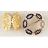 A high purity gold circle brooch with 6 blue enamel ellipsis each interspaced by a pearl,