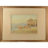 A watercolour of a fishing harbour signed by Rubens Southey, framed and glazed,