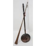 A large copper hunting horn, length 124cm and a Victorian copper warming pan.