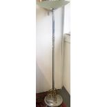 An Art Deco chromium plated standard uplighter with scrolling tripod brackets to the base,