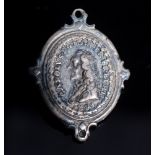 A rare Loyalist silver cruciform pendant, the obverse with a head of Charles l,