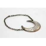 A George III silver decanter label for Sherry in the form of a crescent moon with beaded border,