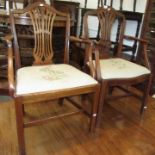 Two George III mahogany open armchairs,