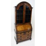 A George II style burr walnut bureau bookcase,