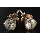 A pair of old cut diamond earrings, each diamond approximately 1ct, set in 18ct gold,