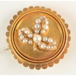 A Victorian matte gold flowerhead brooch by Collingwood & Son, Conduit Street, London,