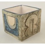A Troika small cube vase, height 8cm.