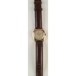 A gentleman's square 9ct gold cased wristwatch, the dial signed J.W.