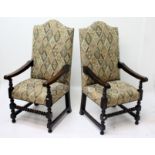 A pair of Cromwellian style oak open armchairs,