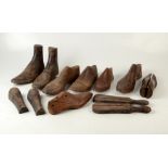 A quantity of wooden shoe lasts.