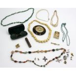 Ivory necklace, jade necklace etc.