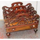 A Victorian walnut canterbury,