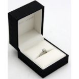 A solitaire diamond ring of approx 0.5ct set in white gold.