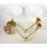 A pair of Christopher Ray gilt metal swing arm adjustable wall lights,