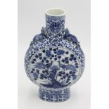 A Chinese blue and white moon flask with dragon shoulders, height 35cm, repaired.