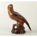 A pottery model of a parrot in Whieldon style, height 17.5cm.