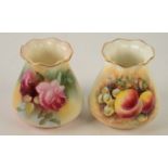 An early 20th century Worcester rose painted vase, shape G957, and a fruit painted shape G957 vase,