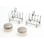 A pair of silver four section wire toast racks by Jay Richard Attenborough Co Ltd, Chester 1908,