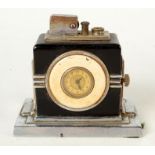 An Art Deco Ronson clock/lighter, height 9.5cm, width 10.5cm, depth 6.5cm.