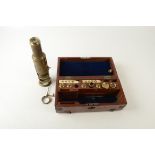 A 19th century brass microscope signed 'J.