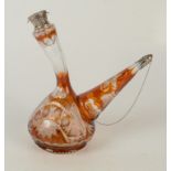 A continental amber flash cut glass wine pourer, with white metal mounted stopper and cover,