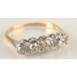 A five stone diamond ring set in gold. Condition report: Scratches to diamonds 2.