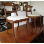 A pair of Regency rosewood brass inlaid dining chairs, height 83cm.