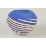 A Norman Stuart Clarke red and white spiral blue glass vase, height 13.5cm.