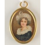 A miniature portrait of a girl with a mop cap.