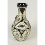 A Moorcroft pottery `Rain Daisy` pattern vase, shape 372, by Rachel Bishop, floral decorated,