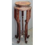 A Chinese hardwood jardiniere stand, the circular top on curvilinear supports, height 112cm,