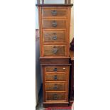 A pair of Edwardian walnut bedside chests, each with four drawers, height 76cm, width 43.