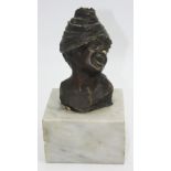 A bronze bust of a child indistinctly signed, marble plinth, full height 23cm.