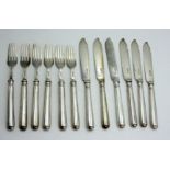 A set of six Harrison Brothers & Howson silver bladed fish knives and forks with filled silver
