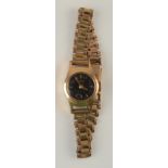 A ladies Oris 9ct gold cased wristwatch on 9ct gold bracelet.