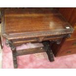 A Victorian oak side table, with a single frieze drawer and heavily carved throughout, height 76cm,