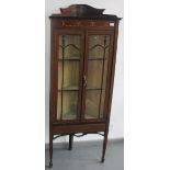 An Edwardian inlaid mahogany standing corner cupboard, height 167cm.