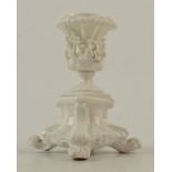 A white porcelain miniature Baroque urn with twin handles,