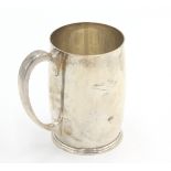 A silver pint mug of slightly bellied form by Mappin & Webb, 12.5oz.