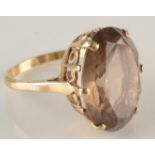 A 9ct gold ring set with smoky quartz.