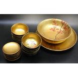 A quantity of Japanese gilt and black lacquered bowls,