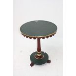 A painted occasional table, the circular top on a turned baluster stem,
