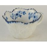 A rare Bow Geranium Leaf butter boat decorated floral sprays in underglazed blue, circa 1758.