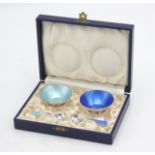 A set of two enamelled Danish silver open salts by Egon Lauridsen with matching enamelled silver