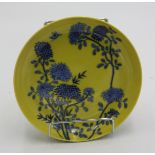 A Chinese porcelain yellow ground dish, Yongzheng mark but later, diameter 20cm.