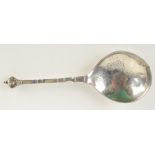 An early continental silver spoon, possibly Dutch, with engraved bowl and cherub finial, length 16.